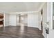 Inviting living room boasts new floors, fresh paint, and an open layout perfect for entertaining at 5601 16Th N St, St Petersburg, FL 33703