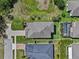 An aerial view of the home shows its location and backyard at 879 De Soto Blvd, Tarpon Springs, FL 34689