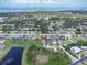 Lovely neighborhood with mature landscaping and water view from this home near Tampa Bay, Florida at 879 De Soto Blvd, Tarpon Springs, FL 34689
