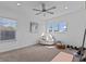 Bright and spacious bedroom with ceiling fan and natural light at 879 De Soto Blvd, Tarpon Springs, FL 34689
