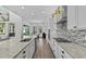 Stylish kitchen features a large island and stainless steel appliances at 879 De Soto Blvd, Tarpon Springs, FL 34689
