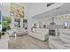 Bright, open floor plan boasts a comfortable living area with lots of natural light and an adjacent kitchen at 879 De Soto Blvd, Tarpon Springs, FL 34689
