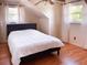 Bedroom with natural light, hardwood floors, a ceiling fan, and neutral colors to relax and recharge at 9201 86Th Ave, Seminole, FL 33777