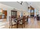 Formal dining room featuring a large table, hutch, and soaring ceilings at 9298 Carr Rd, Riverview, FL 33569