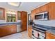 Well-equipped kitchen with stainless steel appliances and ample cabinet space at 9298 Carr Rd, Riverview, FL 33569