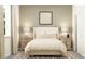 Cozy bedroom with neutral tones, matching nightstands and lamps, and ample natural light at 11857 Sparkling Topaz Cv, Parrish, FL 34219