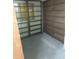 Room featuring multiple empty bookshelves and a window at 12231 Fort King Rd, Dade City, FL 33525