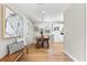 Cozy dining area features hardwood floors, modern lighting, and stylish decor at 1232 Sedeeva S Cir, Clearwater, FL 33755
