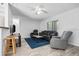 Comfortable living room with tile floors and ample seating at 12597 Cumberland Dr, Largo, FL 33773