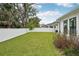 Backyard with grassy area and privacy fence at 13460 Bergamont Cir, Tampa, FL 33618
