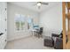 Bright bedroom with natural light, wood-look floors and modern decor at 13460 Bergamont Cir, Tampa, FL 33618