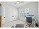 Bright bedroom with carpet, shutters, ceiling fan, closet and furniture at 13460 Bergamont Cir, Tampa, FL 33618