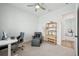 Bright bedroom with natural light, wood-look floors, and modern decor at 13460 Bergamont Cir, Tampa, FL 33618