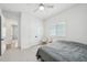 Comfortable bedroom featuring a bed, natural light and modern decor at 13460 Bergamont Cir, Tampa, FL 33618