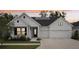 Charming home with solar panels, well-maintained landscaping, two-car garage and covered porch at 13460 Bergamont Cir, Tampa, FL 33618