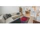Comfortable living room with stylish decor and hardwood floors leading to the kitchen at 13460 Bergamont Cir, Tampa, FL 33618