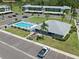 Aerial view of the community pool and clubhouse at 135 Nina Way # 35, Oldsmar, FL 34677