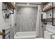Modern bathroom featuring black hardware, open shelving and decorative backsplash at 135 Nina Way # 35, Oldsmar, FL 34677