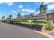 A covered parking area with designated parking spots for residents and guests at 135 Nina Way # 35, Oldsmar, FL 34677