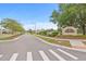 Inviting entrance to the Cambridge Place community with well-maintained landscaping and clear signage at 13675 Paddington Way, Spring Hill, FL 34609