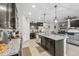 Spacious kitchen with granite countertops, stainless steel appliances, and ample cabinet space at 13675 Paddington Way, Spring Hill, FL 34609