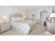 This bedroom features white decor, providing a calming space for rest and relaxation at 1400 Gulf Blvd # 511, Clearwater Beach, FL 33767