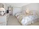 Bedroom featuring twin beds, a dresser, and access to additional storage at 1400 Gulf Blvd # 511, Clearwater Beach, FL 33767
