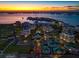 Stunning aerial view of the bay, luxury buildings, and golf course at 145 Belleview Blvd # 201, Belleair, FL 33756