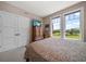 Inviting bedroom featuring ample natural light and stylish accents at 145 Belleview Blvd # 201, Belleair, FL 33756