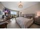 Bedroom with sitting area and access to balcony with scenic views at 145 Belleview Blvd # 201, Belleair, FL 33756
