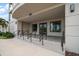 Elegant condo building entrance with clean design, steps, and well-maintained landscaping, presenting a welcoming facade at 145 Belleview Blvd # 201, Belleair, FL 33756
