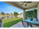 Relaxing outdoor patio with a view of the pond, perfect for enjoying the outdoors at 1476 Fort Cobb Ter, Wesley Chapel, FL 33543