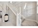 Elegant staircase with decorative wall trim at 1476 Fort Cobb Ter, Wesley Chapel, FL 33543