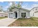 Charming single-story home with attached garage and driveway at 1524 Marsh Wood Dr, Seffner, FL 33584