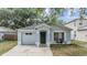 Charming single-Gathering home featuring an attached garage and inviting front entrance at 1524 Marsh Wood Dr, Seffner, FL 33584
