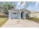 Charming single-story home with attached garage and driveway at 1524 Marsh Wood Dr, Seffner, FL 33584