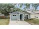 Charming single-Gathering home with a one car garage, neutral paint, and a well-maintained front yard at 1524 Marsh Wood Dr, Seffner, FL 33584
