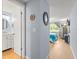 Hallway showcasing access to the bath and main bedroom at 16116 Manorwood Cir, Tampa, FL 33624