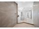 Modern bathroom features a glass shower, standalone tub, and elegant lighting at 19816 Gulf Blvd # 602, Indian Shores, FL 33785