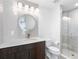 Modern bathroom with white subway tile, glass-enclosed shower, and stylish vanity at 19816 Gulf Blvd # 602, Indian Shores, FL 33785