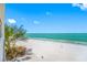 Stunning ocean view showcases the sandy beach and crystal-clear turquoise water at 19816 Gulf Blvd # 602, Indian Shores, FL 33785