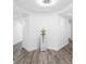 Modern foyer with statement art piece, hardwood floors, and elegant architectural details at 19816 Gulf Blvd # 602, Indian Shores, FL 33785