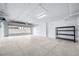 Large two car garage with ample lighting and a large, tiled floor for modern appeal and parking convenience at 19816 Gulf Blvd # 602, Indian Shores, FL 33785