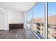 This room features a window with ocean views, built-in cabinets, and hardwood floors at 19816 Gulf Blvd # 602, Indian Shores, FL 33785