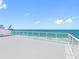 Rooftop deck overlooking the ocean with glass railings for unobstructed views of the water at 19816 Gulf Blvd # 602, Indian Shores, FL 33785