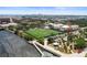 Aerial view displays waterfront property with nearby ball field and a tranquil walking bridge at 201 W Laurel St # 307, Tampa, FL 33602