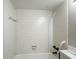 Bathroom with tile shower and white shelving at 201 W Laurel St # 307, Tampa, FL 33602
