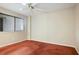 Bedroom with a ceiling fan, natural light, and neutral paint at 201 W Laurel St # 307, Tampa, FL 33602
