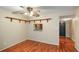 Dining area features hardwood floors and a passthrough to another room, creating an open atmosphere at 201 W Laurel St # 307, Tampa, FL 33602