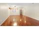 Bright living room featuring wood floors, neutral walls, and a ceiling fan at 201 W Laurel St # 307, Tampa, FL 33602